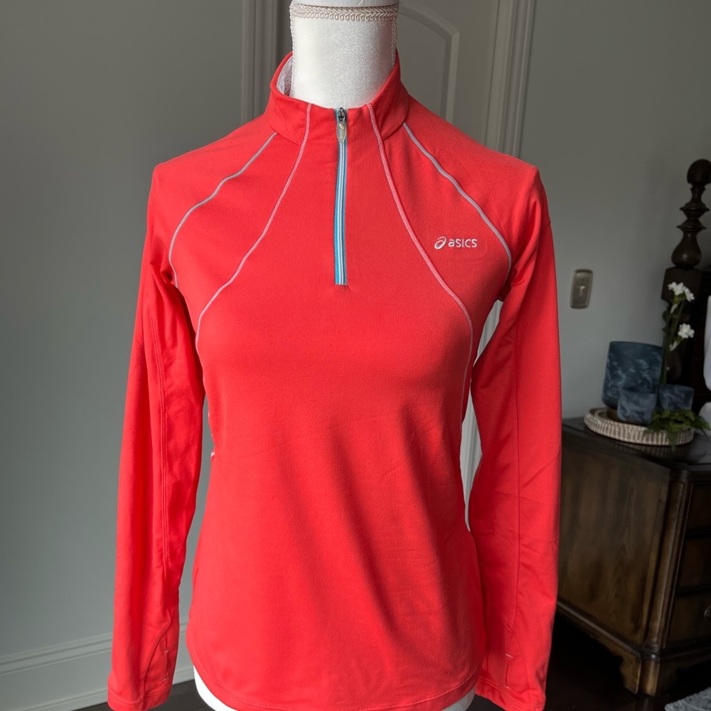 Woman’s ASICS long sleeve 1/4 zip pullover